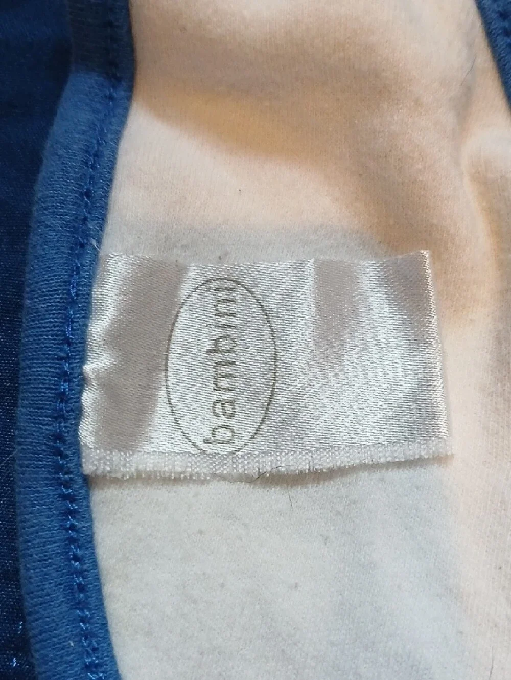 Bambini Cream Bib with Blue Trim and Submarine Applique